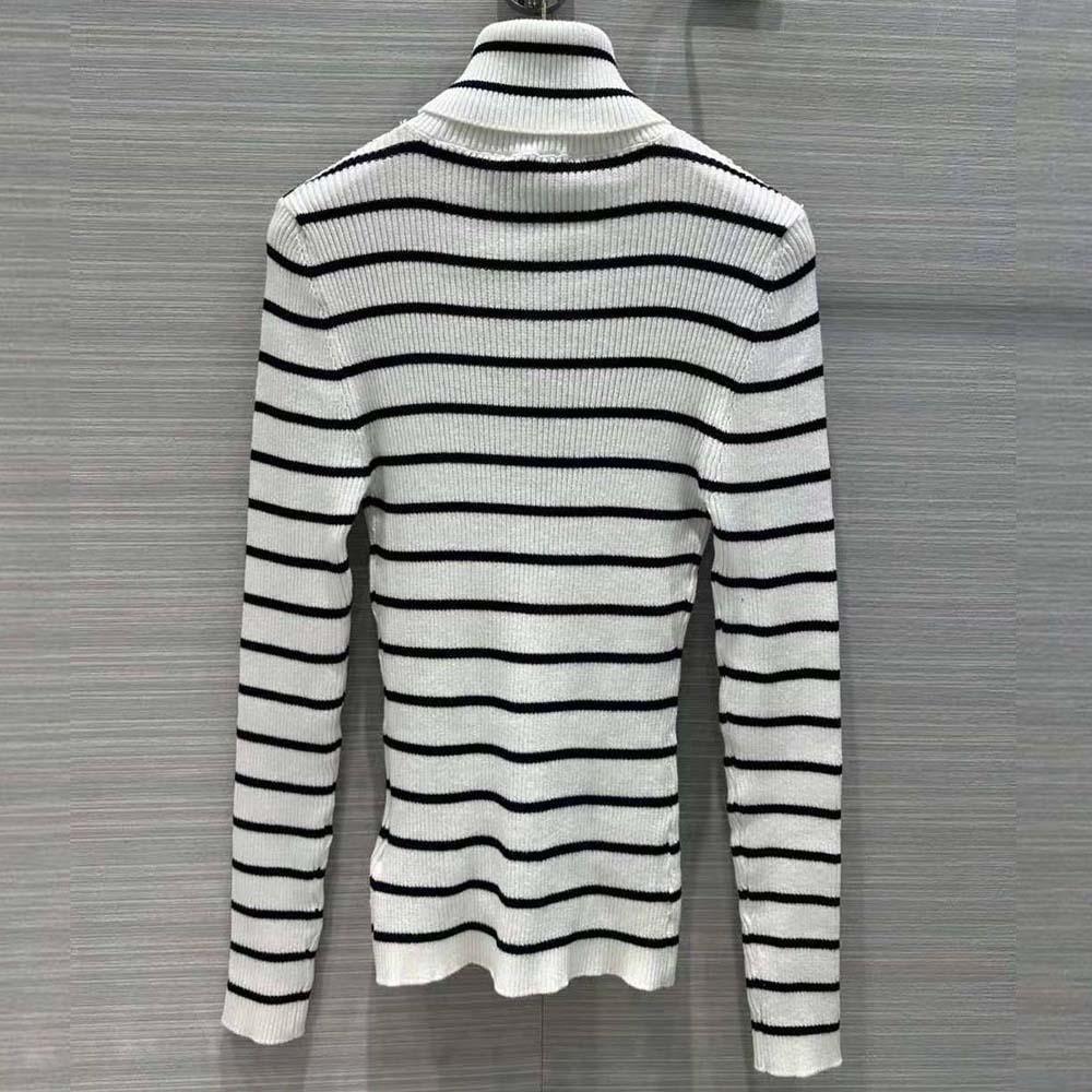 Side profile showcasing slim fit of Prada Women Superfine Wool Turtleneck Sweater