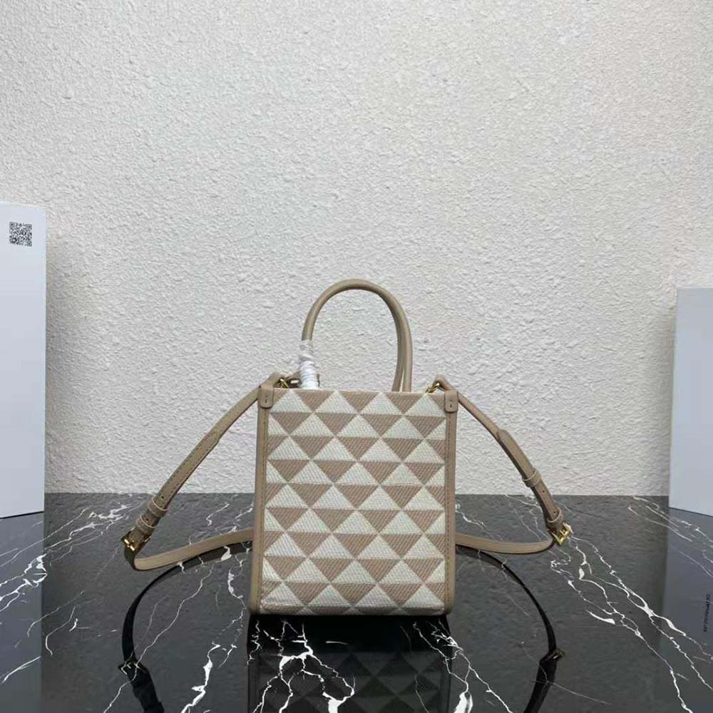 Side angle showing mini bag silhouette and magnetic flap closure