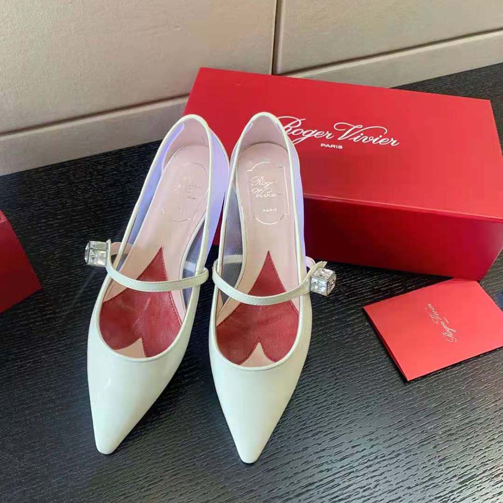 Close-up of silver buckle on Roger Vivier Women Babies Ballerinas white