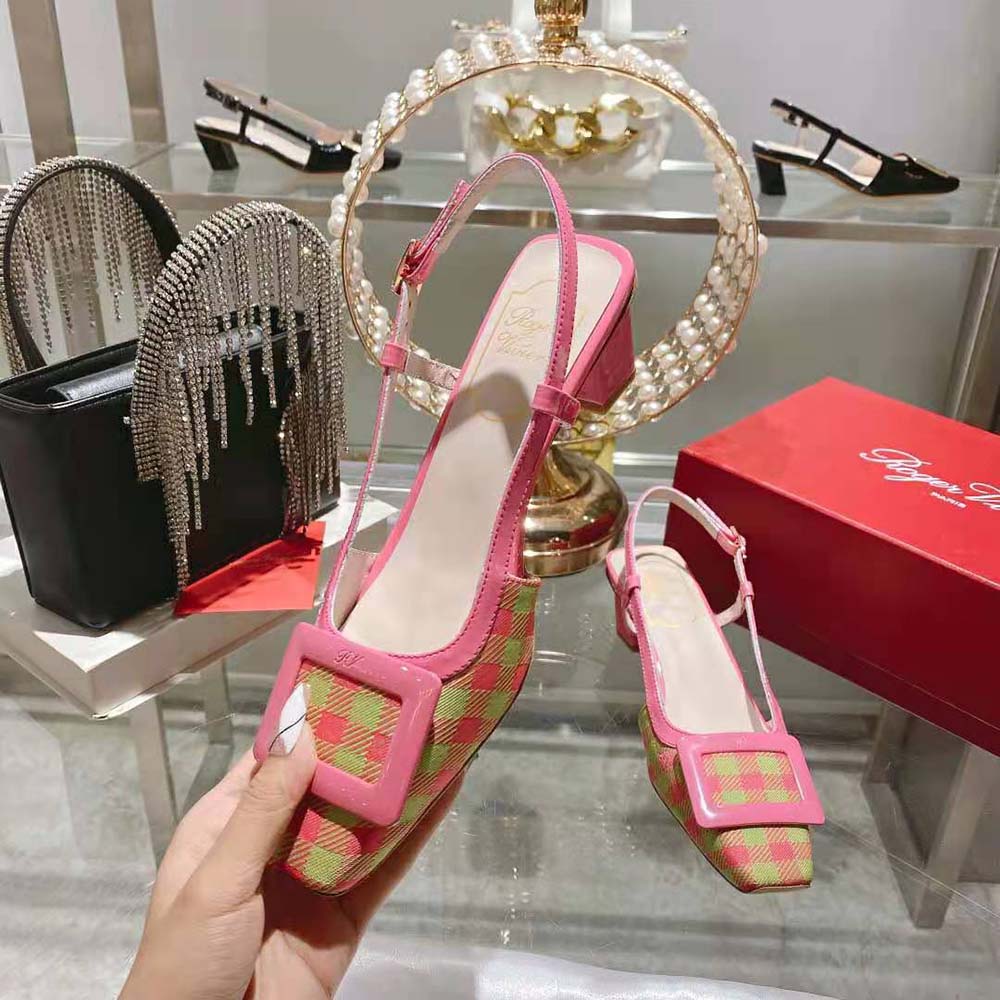 Rear angle showing adjustable slingback strap on Roger Vivier pink pumps