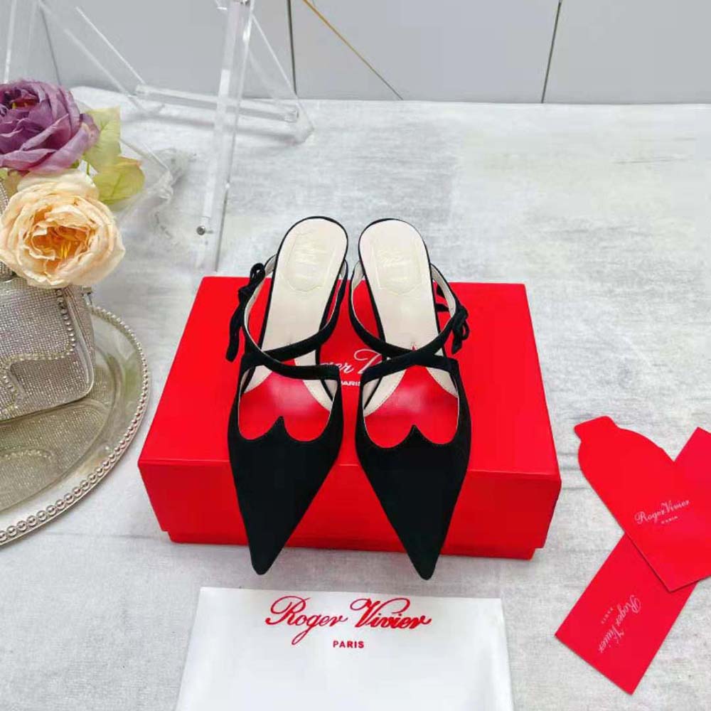 Close-up of iconic oversized bow on Roger Vivier Women I Love Vivier Mules