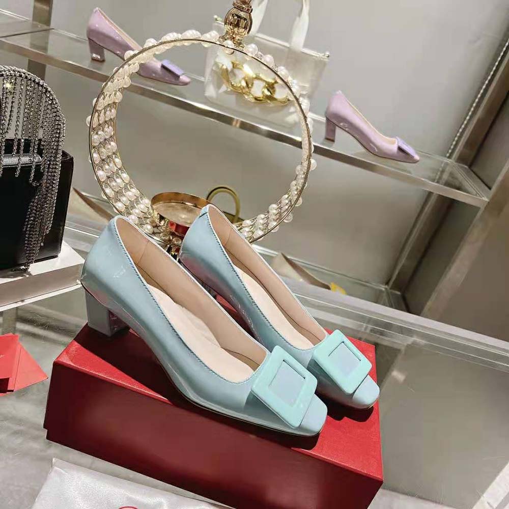 Overhead shot of aqua patent leather surface on Roger Vivier Women Patent Leather Belle Vivier Pumps