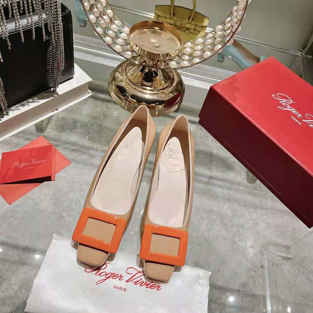 Close-up of signature square buckle on Roger Vivier Belle Vivier Pumps-Orange