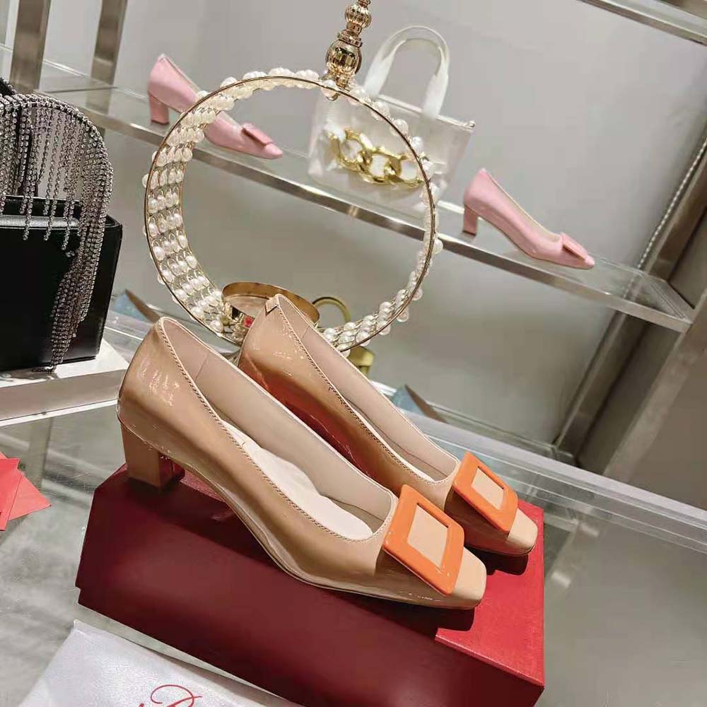 Top-down angle showing glossy patent leather on Belle Vivier Pumps-Orange