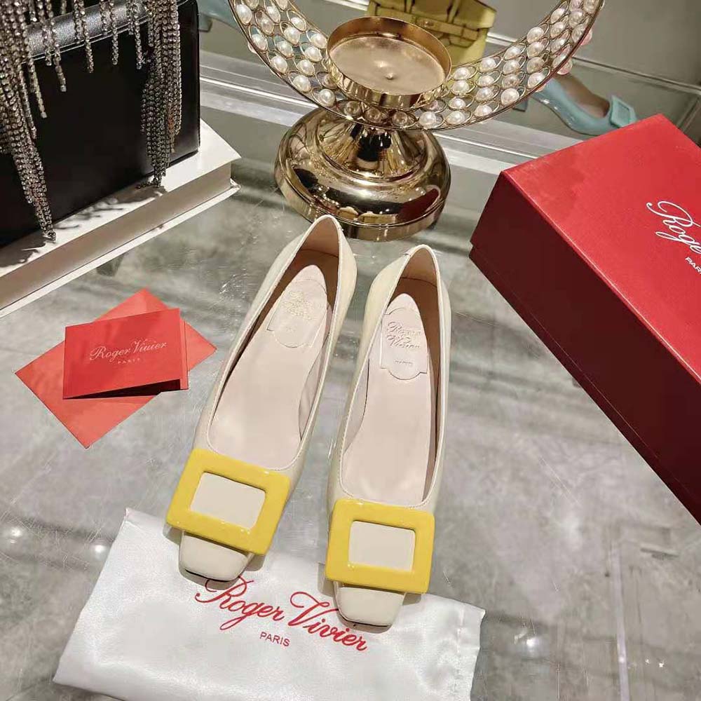 Close-up of signature buckle on Roger Vivier Belle Vivier Pumps-White