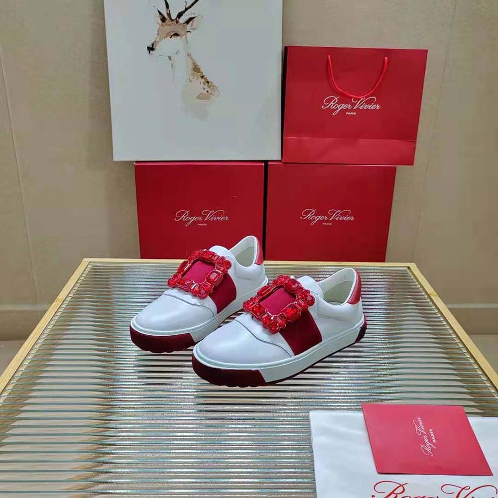 Top-down angle showing lace-up and leather texture of Roger Vivier sneakers