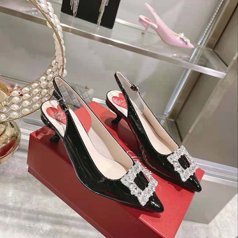 Side profile showing slingback strap and patent leather finish of Roger Vivier pumps
