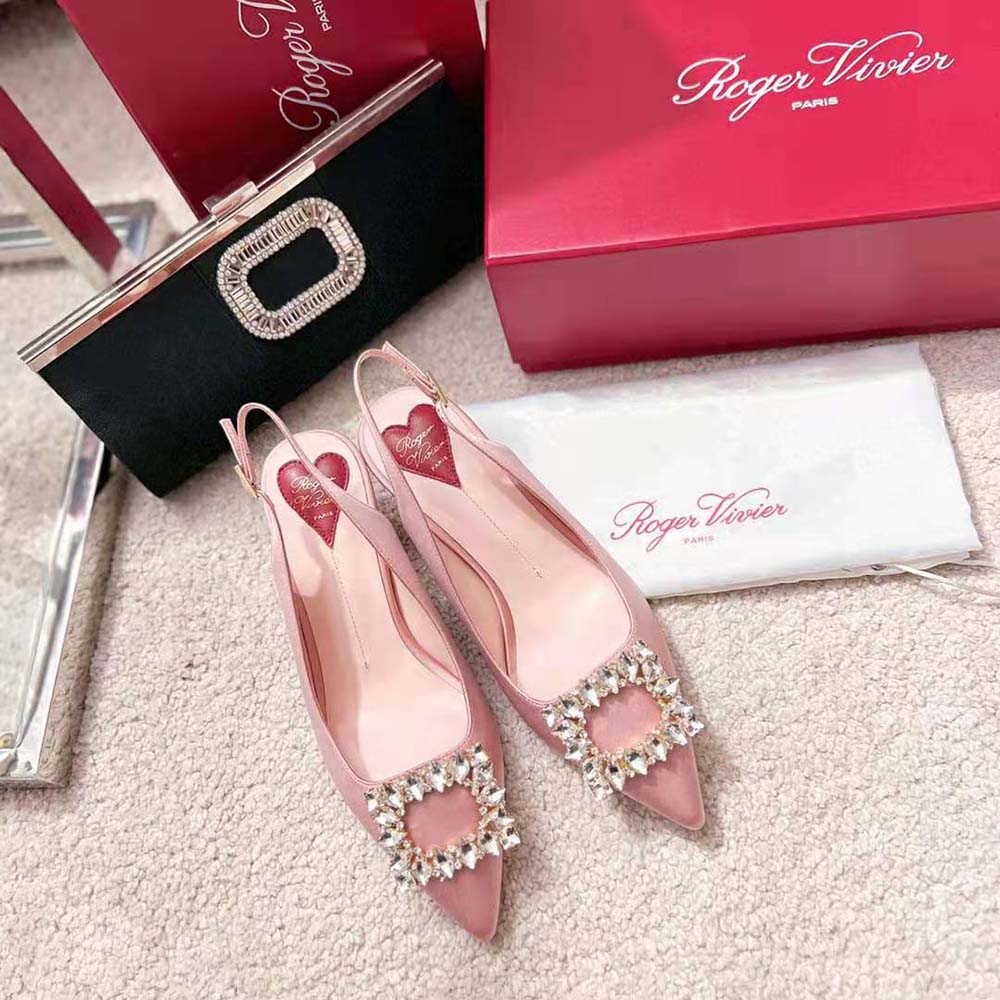 Close-up on sparkling crystal buckle of Roger Vivier Virgule Strass Buckle Slingback Pumps
