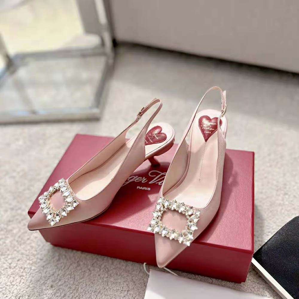 Top angle showing satin pink finish and slingback strap on Roger Vivier pumps