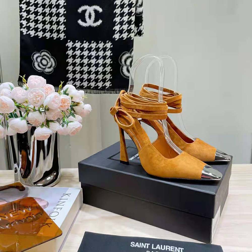 Rear view showcasing slingback strap and blade heel of Saint Laurent pumps