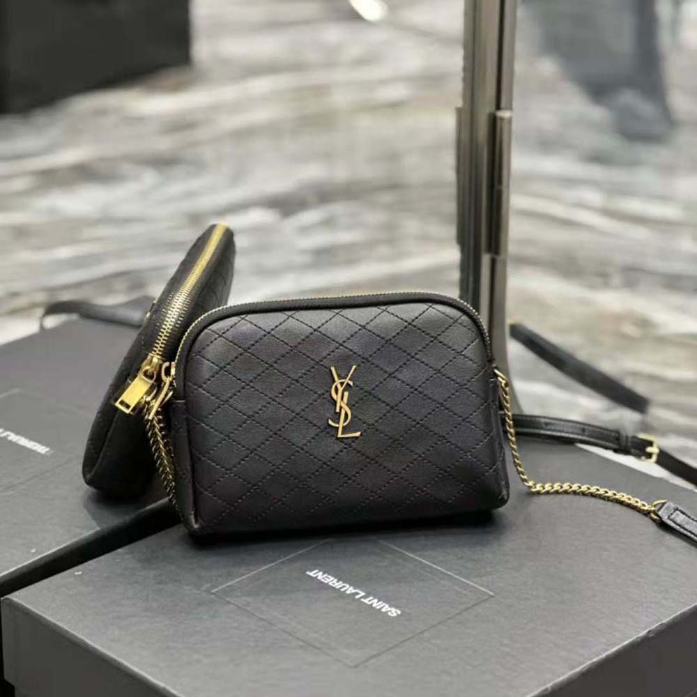 Side angle showing zipped closure and quilted texture of Saint Laurent YSL pouch
