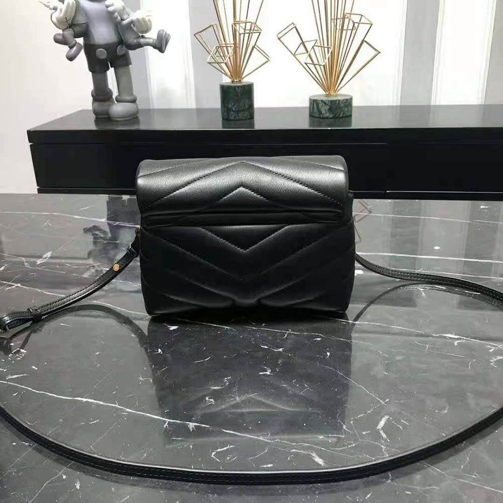 Side profile showing matelassé leather texture on Saint Laurent YSL Loulou Toy Bag
