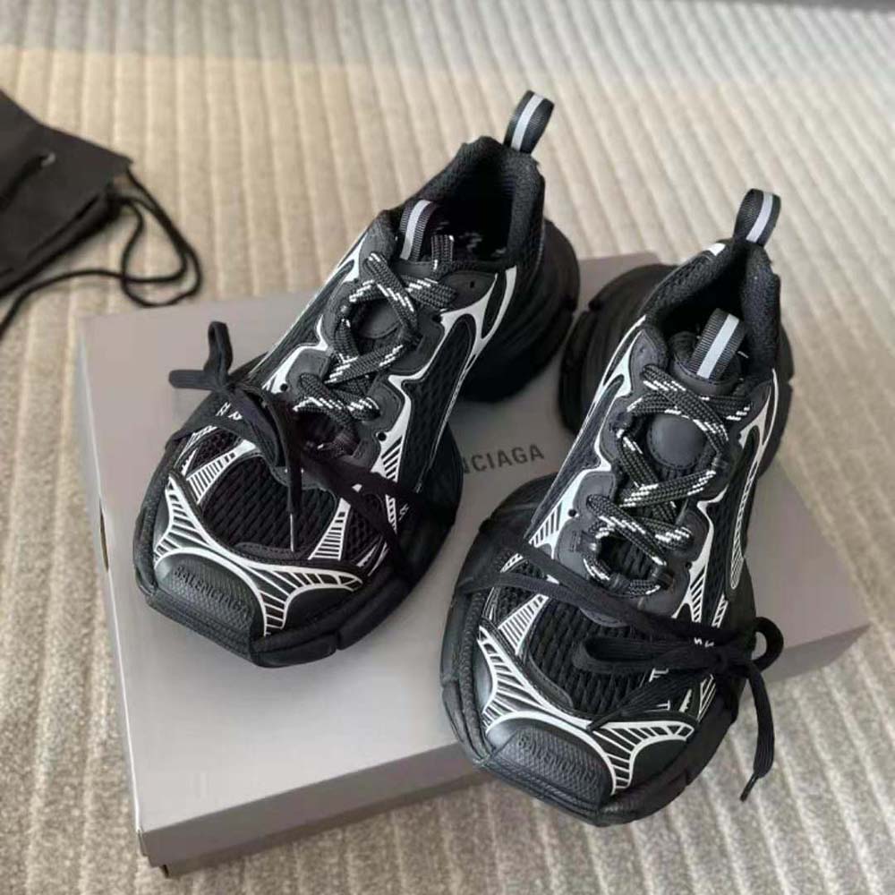 Close-up of Balenciaga Unisex 3XL Sneaker oversized sole and embossed logo