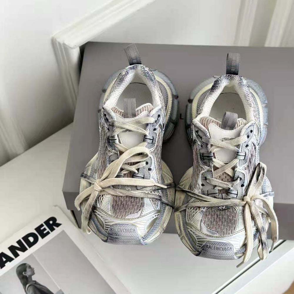 Close-up on embossed Balenciaga logo on 3XL Sneaker polyurethane panel