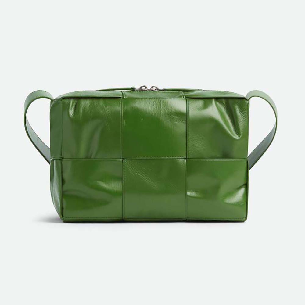 Front view of Bottega Veneta Men Intreccio Slouchy Leather Cross-Body Arco Camera Bag-Green