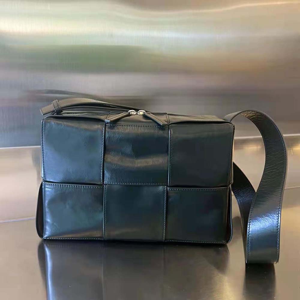 Close-up of black intreccio leather detail on Bottega Veneta Arco Camera Bag