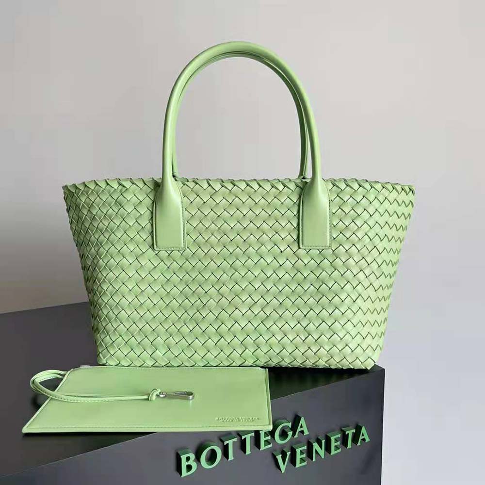 Close-up of silver-tone hardware on Bottega Veneta Medium Cabat Leather Tote Bag in aqua