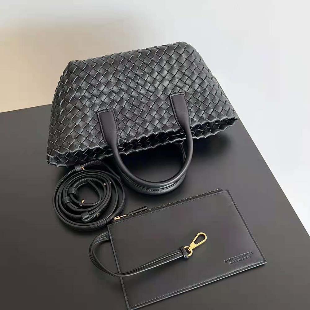 Side angle showing detachable strap and silver hardware on Mini Cabat Tote