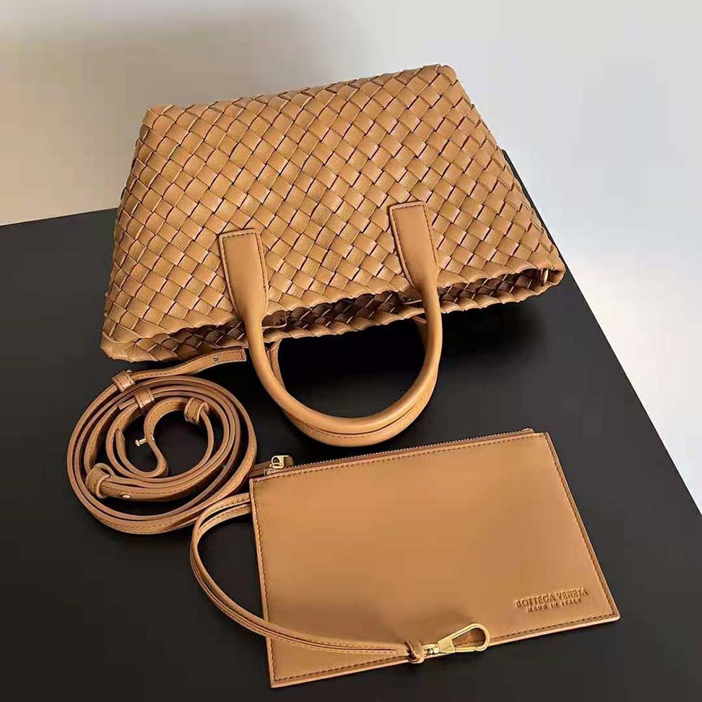 Side angle showing detachable strap and gold hardware on Mini Cabat Tote