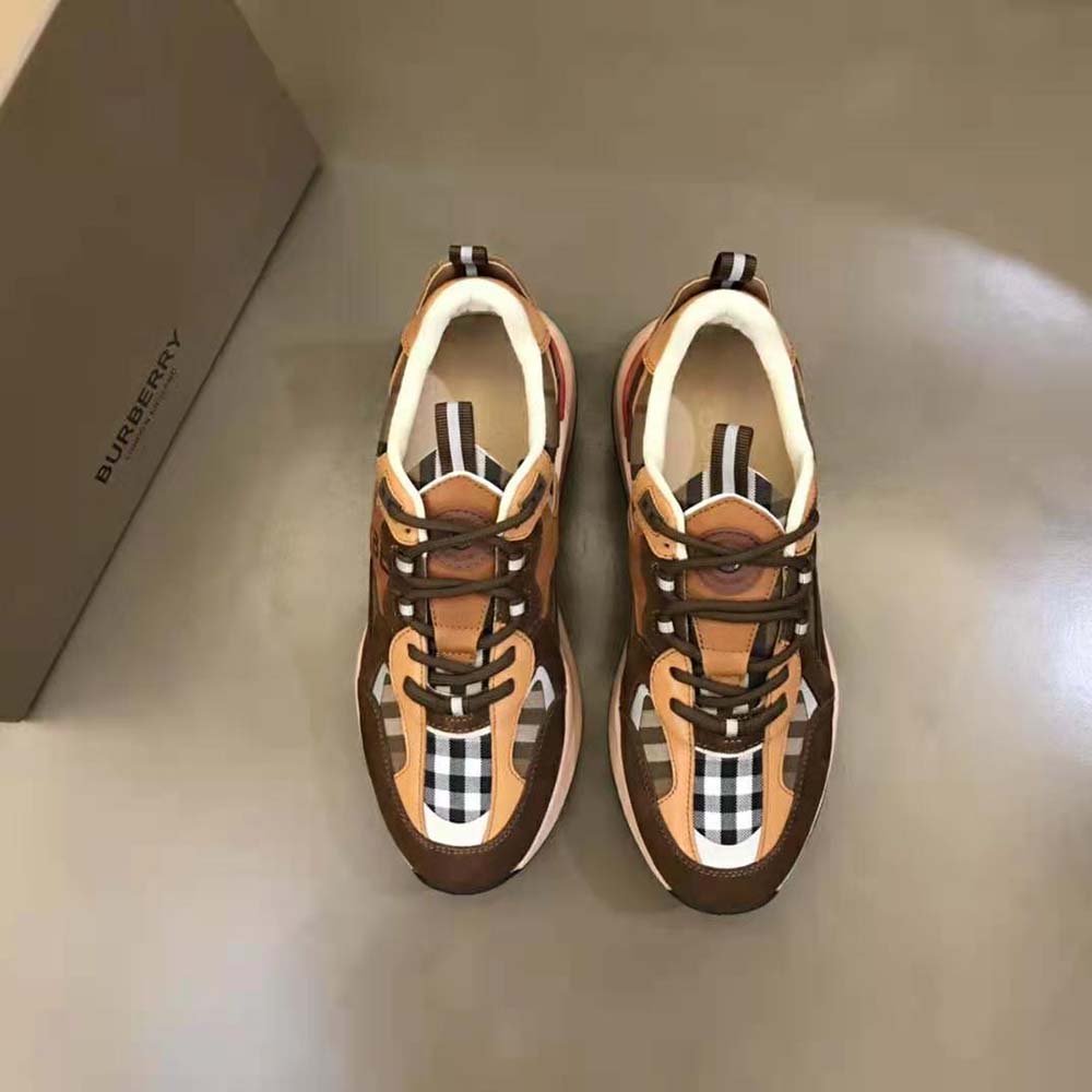 Close-up of brown suede and mesh upper on Burberry sneakers