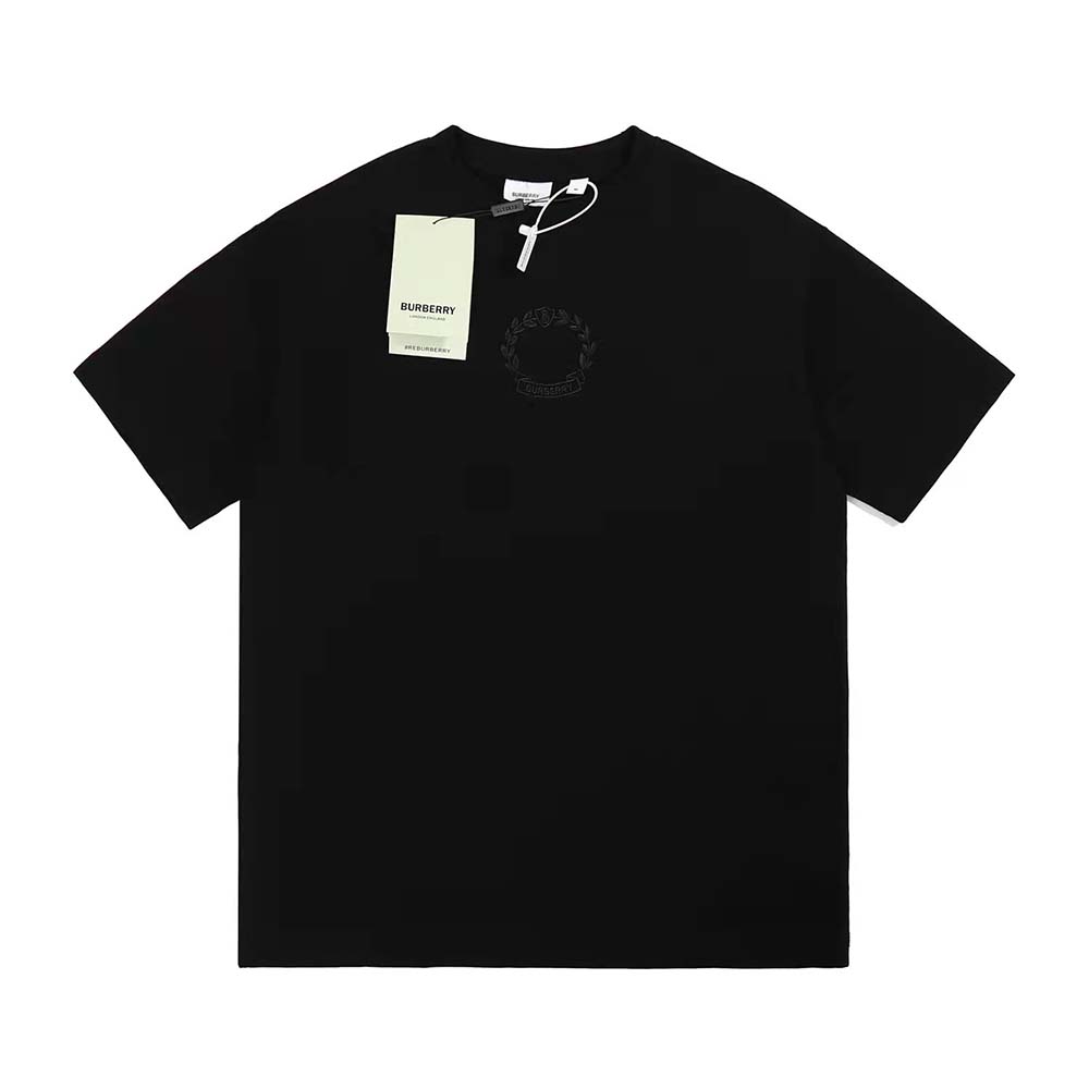 Close-up of embroidered oak leaf crest on Burberry black cotton T-shirt