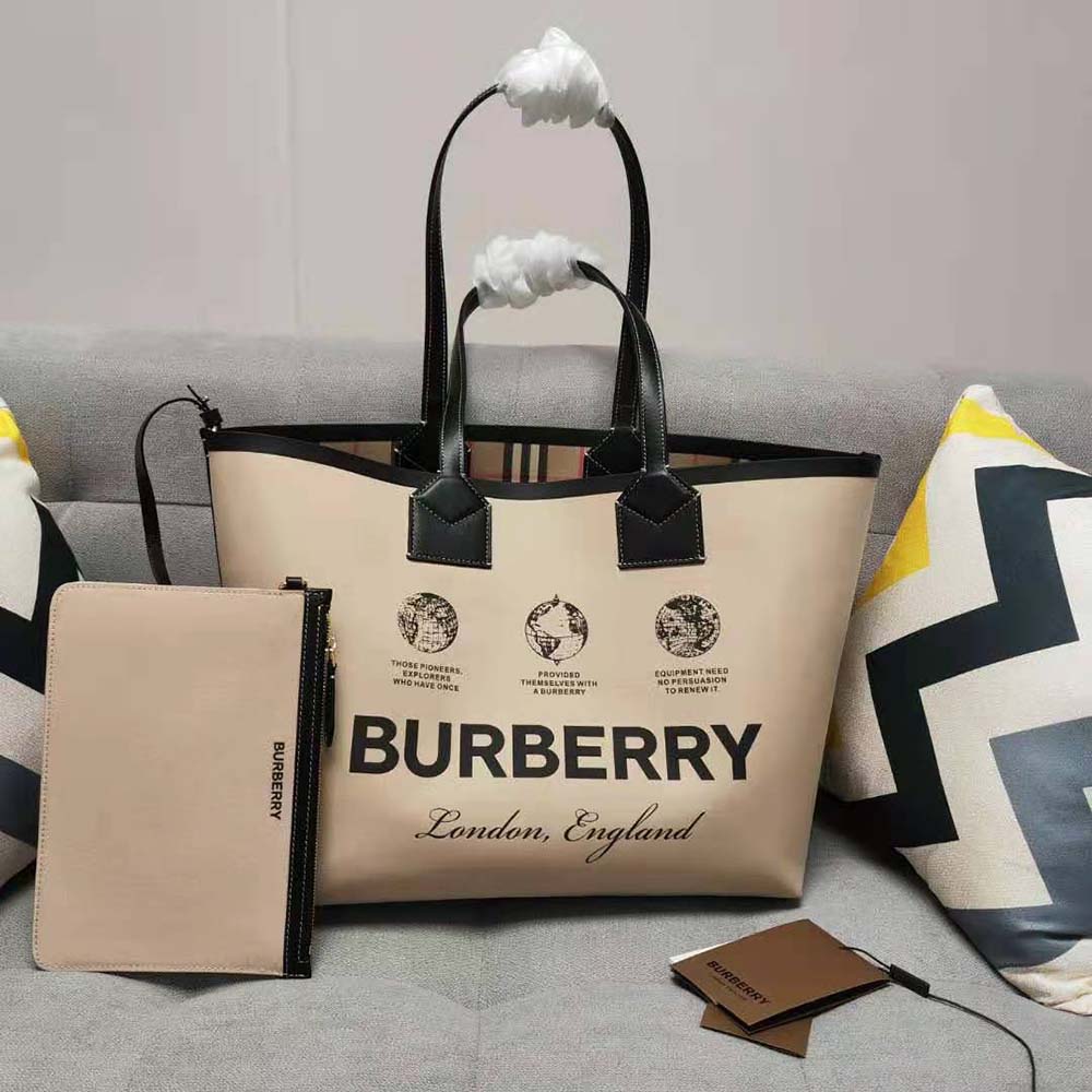 Close-up of gold-tone hardware on Burberry Women Label Print Cotton Medium London Tote Bag