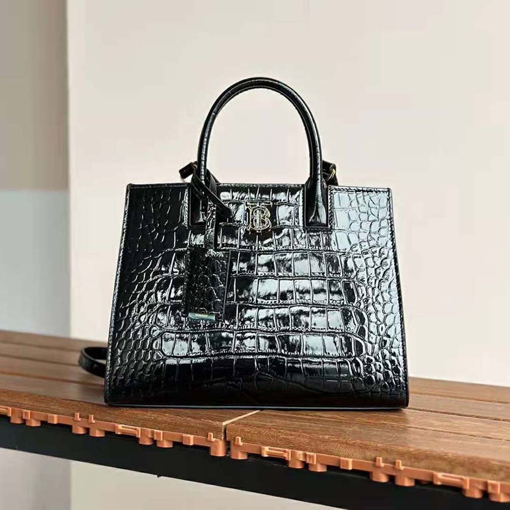 Side angle showing mini silhouette of Burberry Women Mini Frances Bag-Black