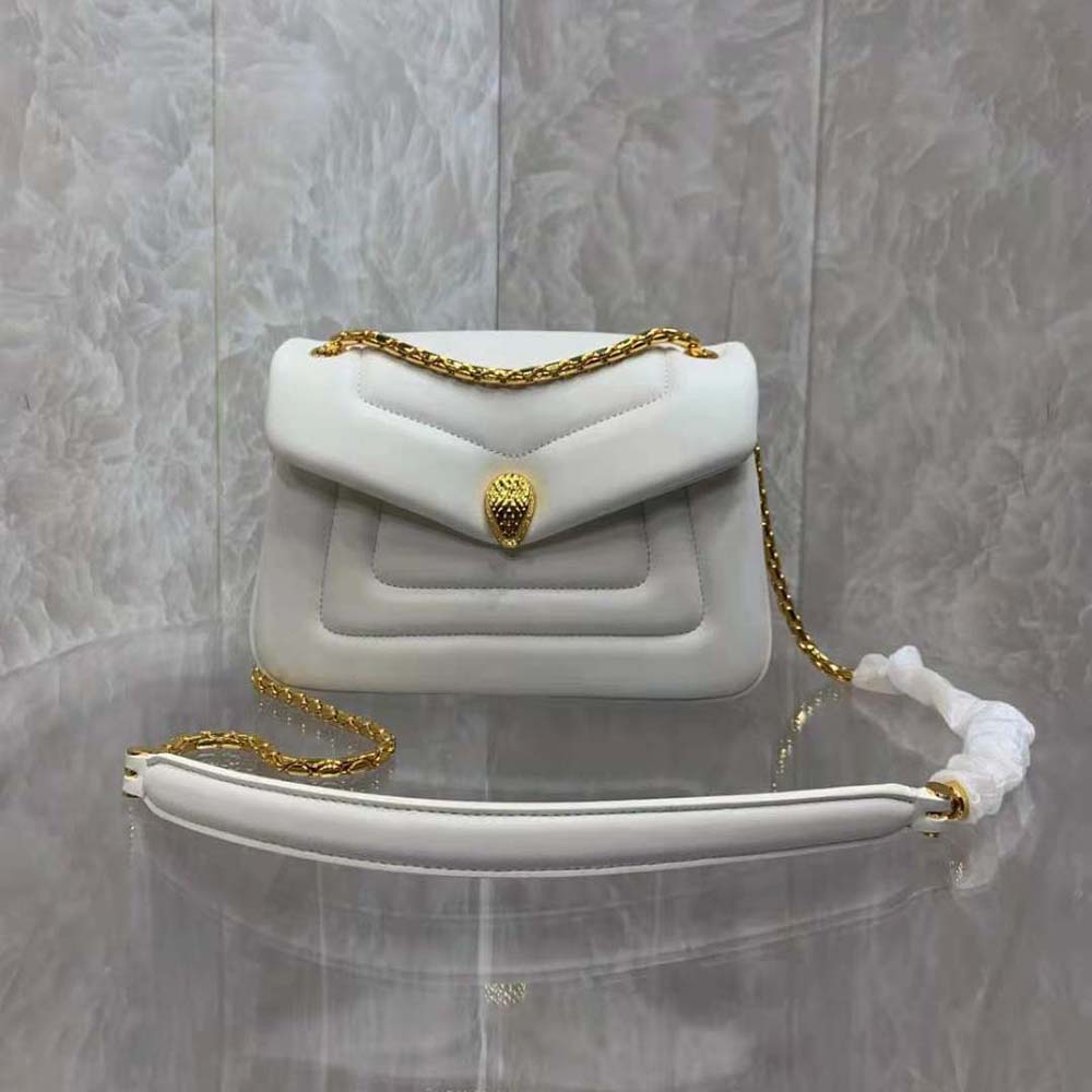 Close-up of gold serpenti hardware on Bvlgari Women Serpenti Reverse Shoulder Bag-White