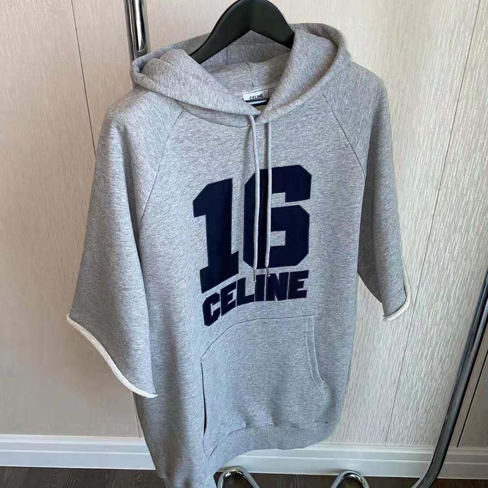 Side angle showing silhouette of Celine Women Celine 16 Hoodie Dress