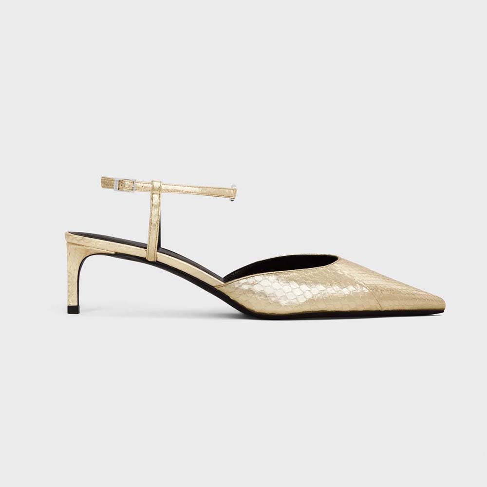 Side view of Celine Women Kitten with Strap Triomphe in Laminated Ayers gold shoe