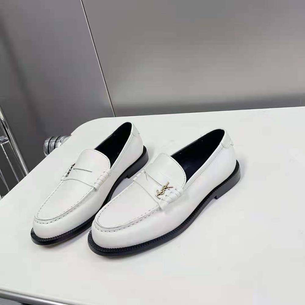 Top view showing classic penny loafer silhouette of Celine Women Le Loafer Penny Slippers