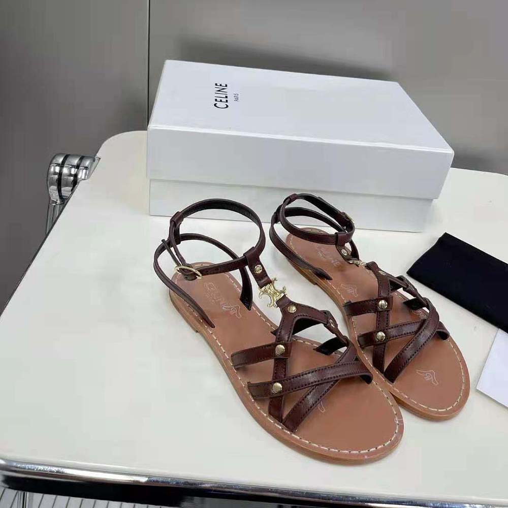 Close-up of gold Triomphe hardware on Celine Women Taillat Triomphe Sandal