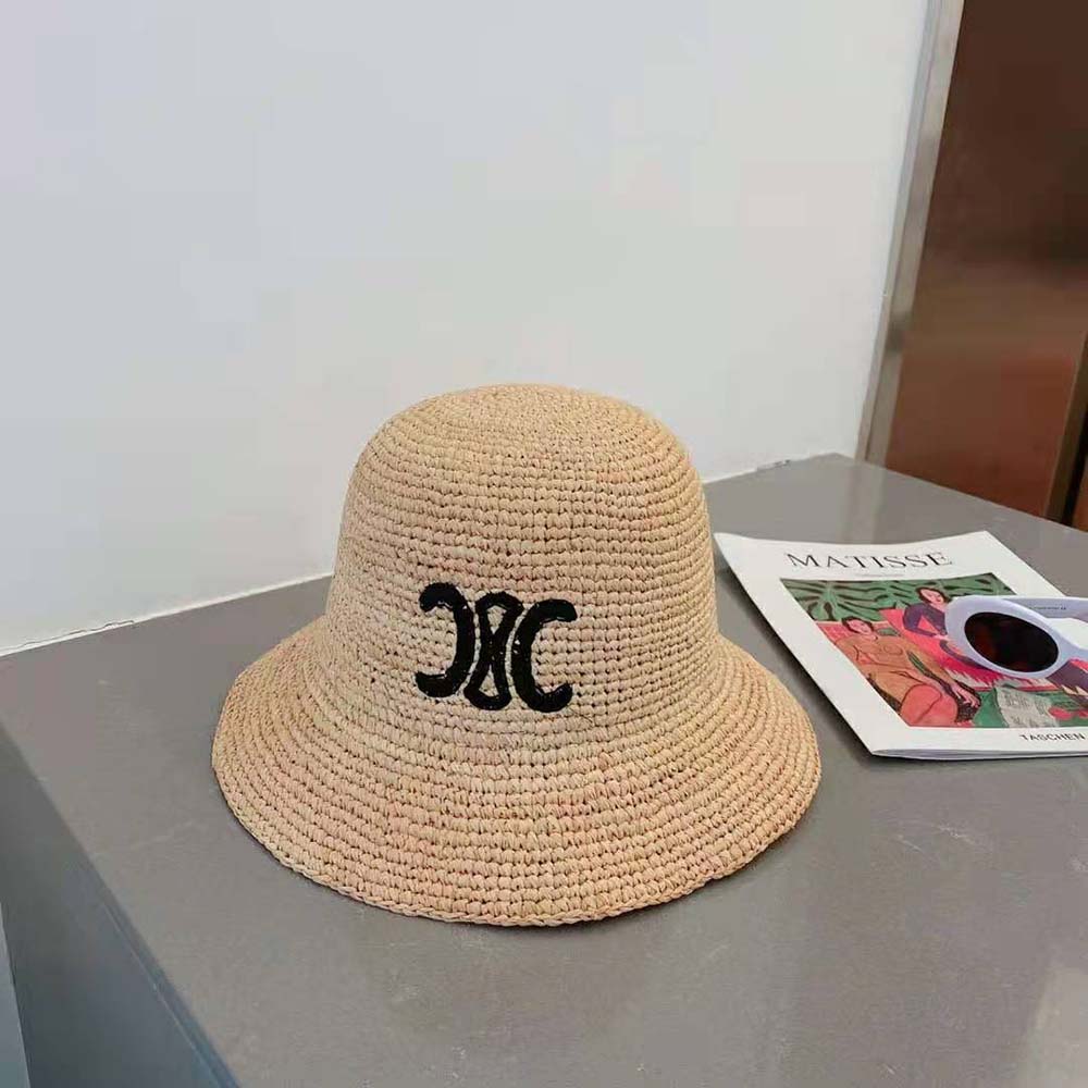 Side angle of Celine Women Triomphe Hat in Raphia highlighting woven raffia texture
