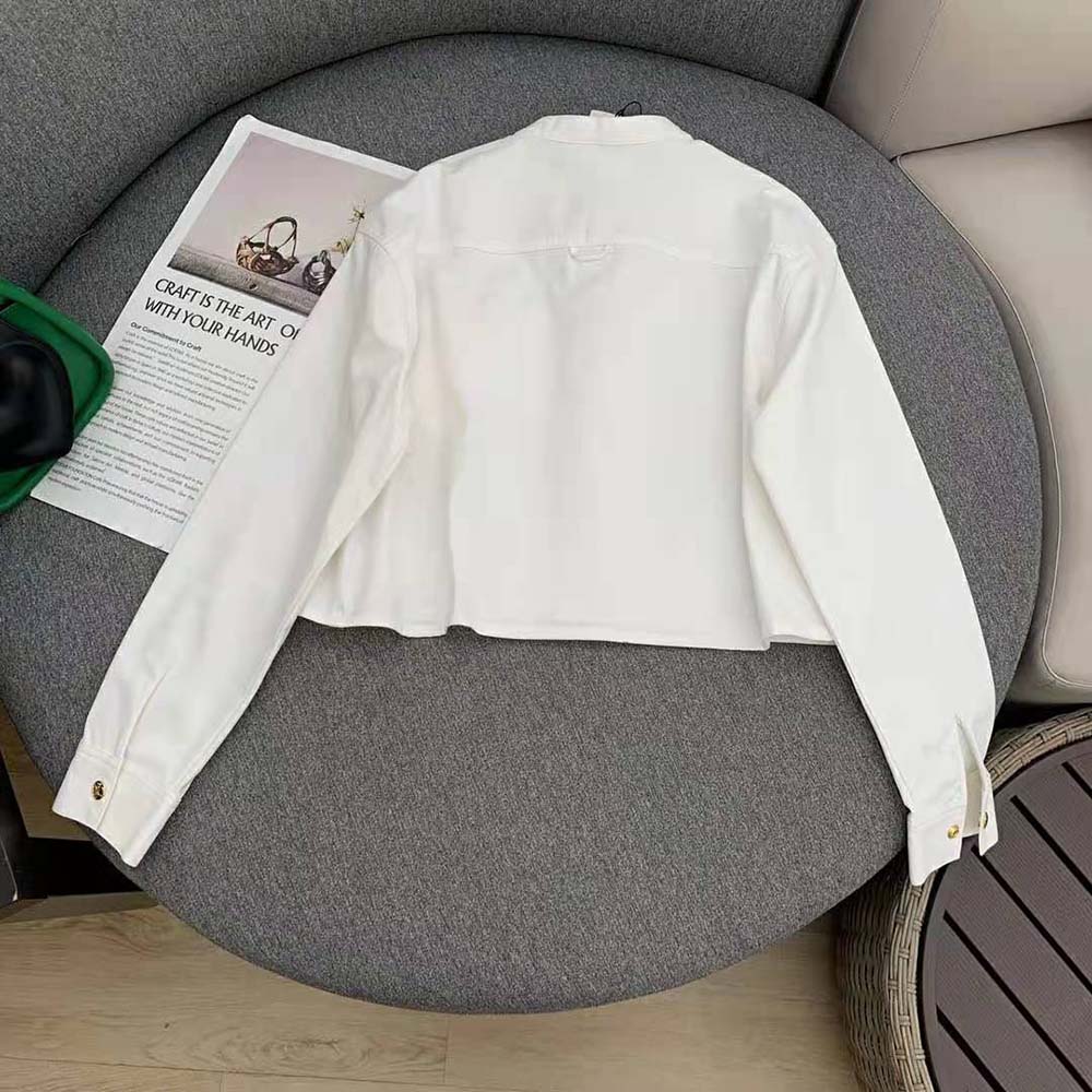 Side profile showing tailored fit of Celine Women Triomphe Pea Jacket