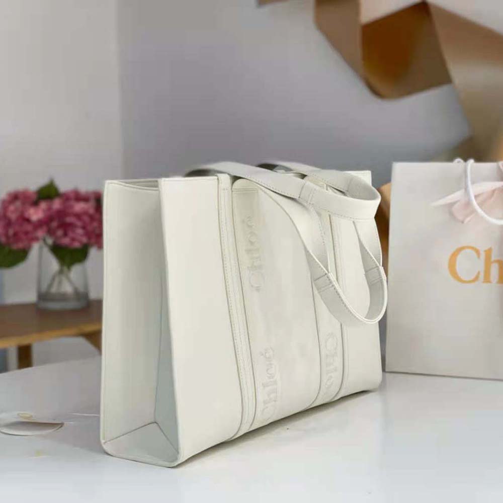 Side angle showing spacious interior of large Woody tote bag by Chloé
