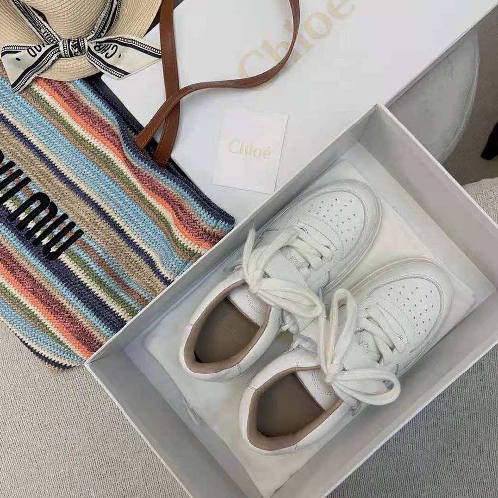 Close-up of sole and detailed stitching on Chloe Women Lauren Sneaker with Strap-White