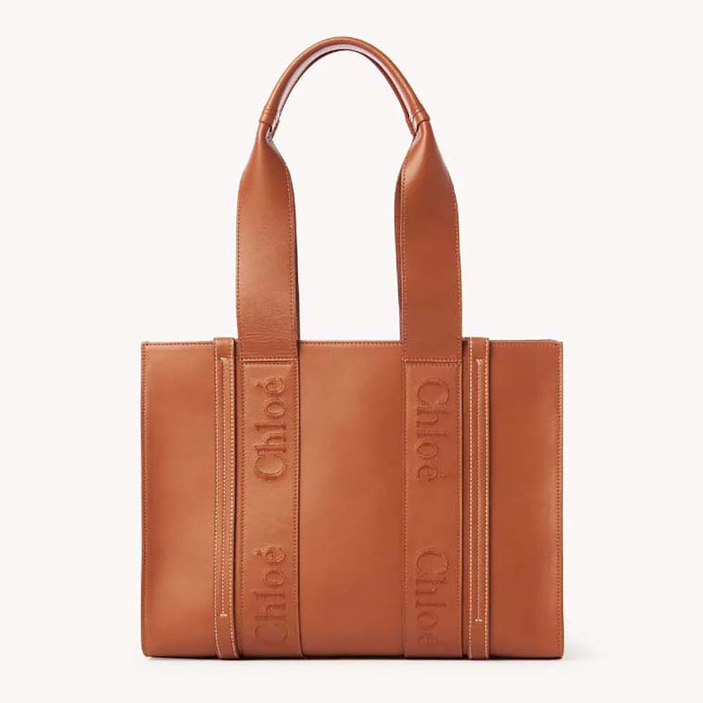 Front view of Chloe Women Medium Woody Tote Bag with embroidered logo brown