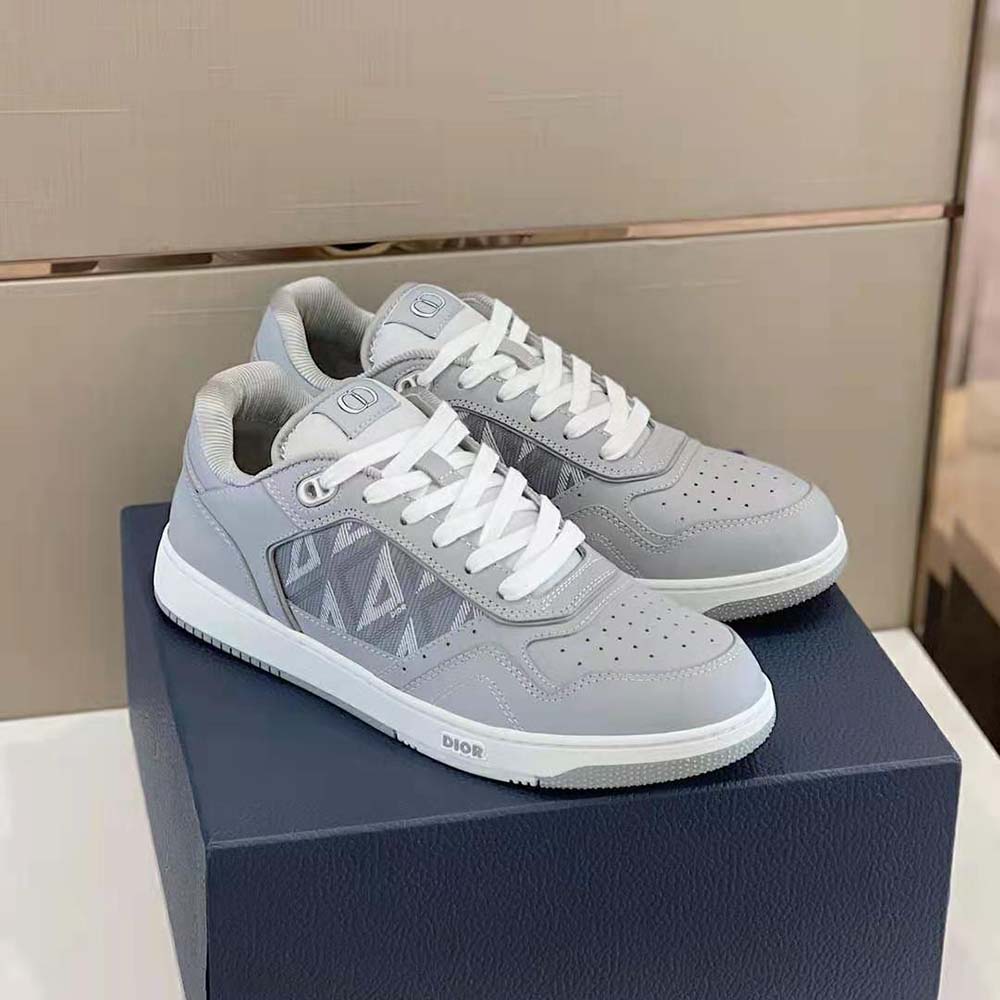 Overhead look at gray calfskin and canvas detail on Dior Men B101 Sneaker