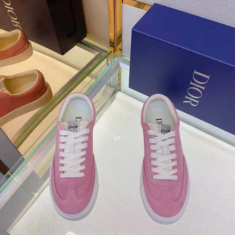 Close-up on pink nubuck leather and Dior embossing detail