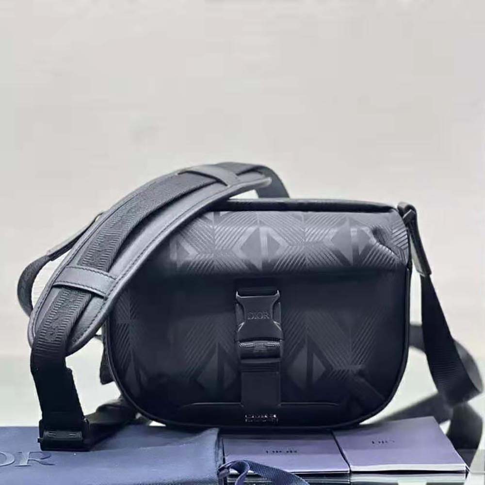 Close-up of silver-tone hardware on Dior Men Explorer Pouch with Strap Black