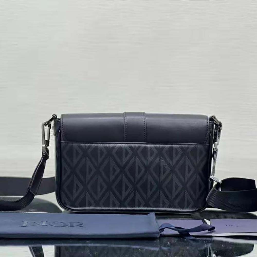 Side angle showing smooth calfskin trim on Dior Men Hit The Road Bag
