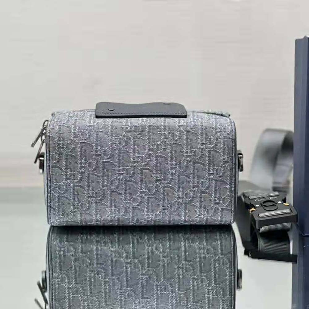 Side profile showing adjustable strap on Dior Men Lingot 22 Bag