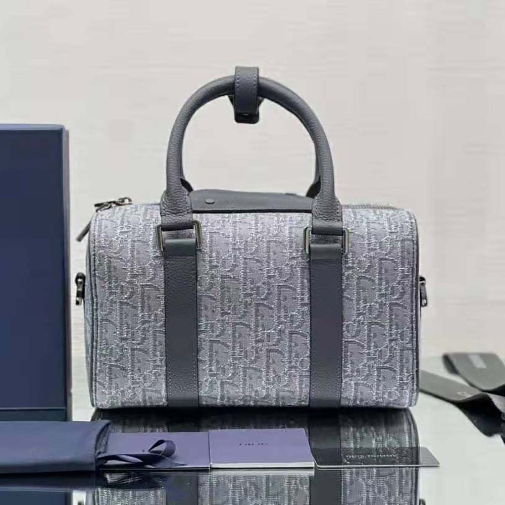 Side view highlighting jacquard fabric texture on Dior Men Lingot 26 Bag