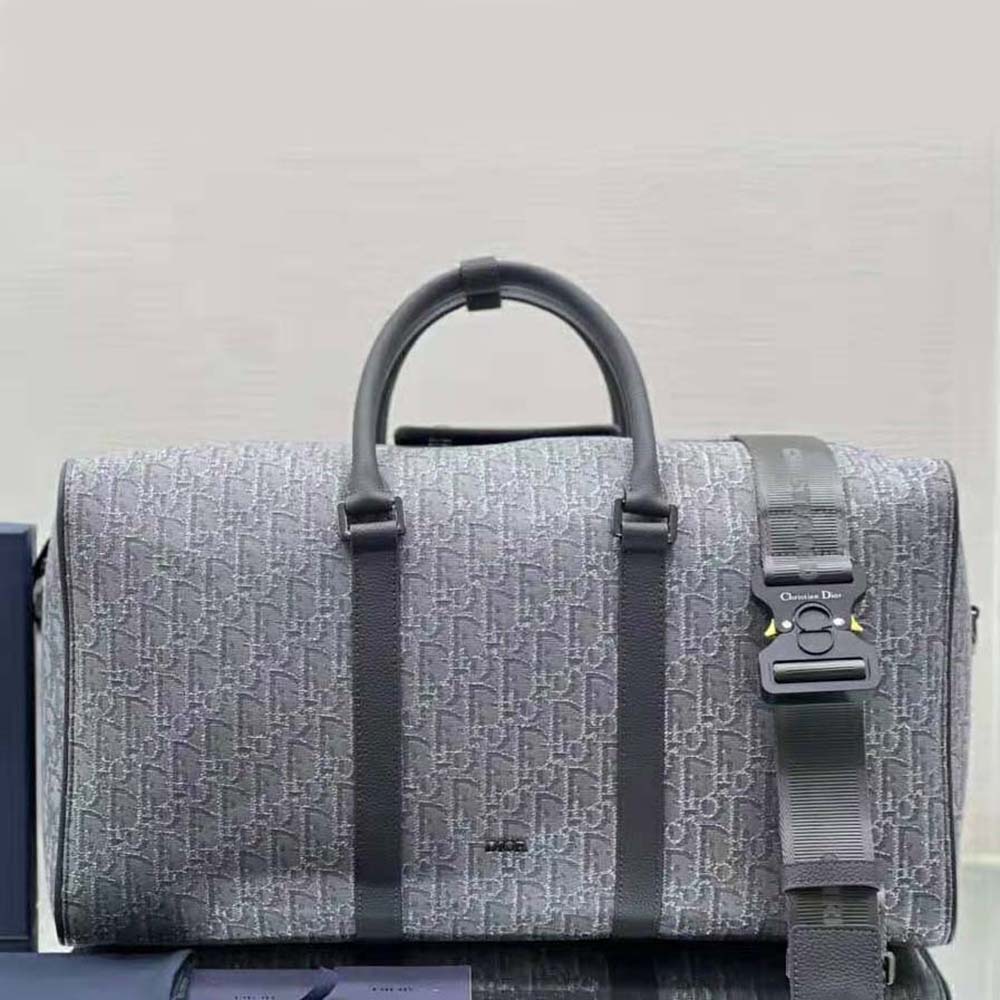 Close-up of ruthenium hardware on Dior Men Lingot 50 Bag