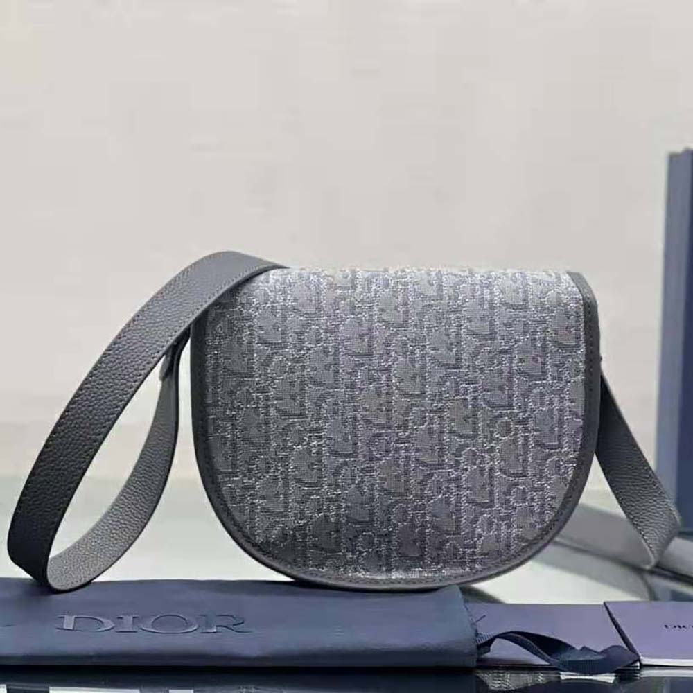 Side angle showing adjustable strap on Dior Men Mini Gallop Bag