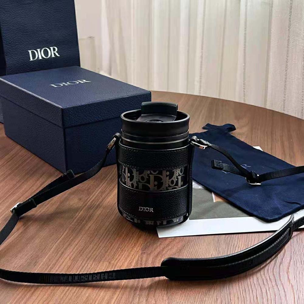 Side angle showing cylindrical silhouette of Dior Unisex Aqua Mug