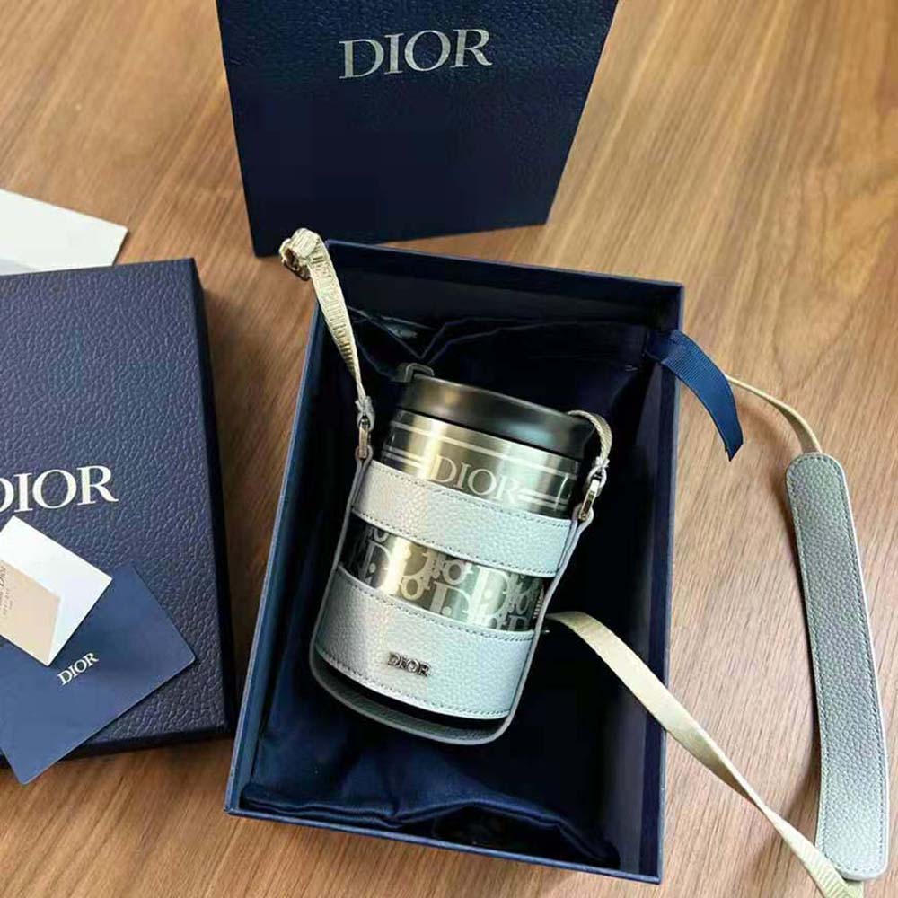 Close-up of gray grained calfskin texture on Dior Unisex Aqua Mug