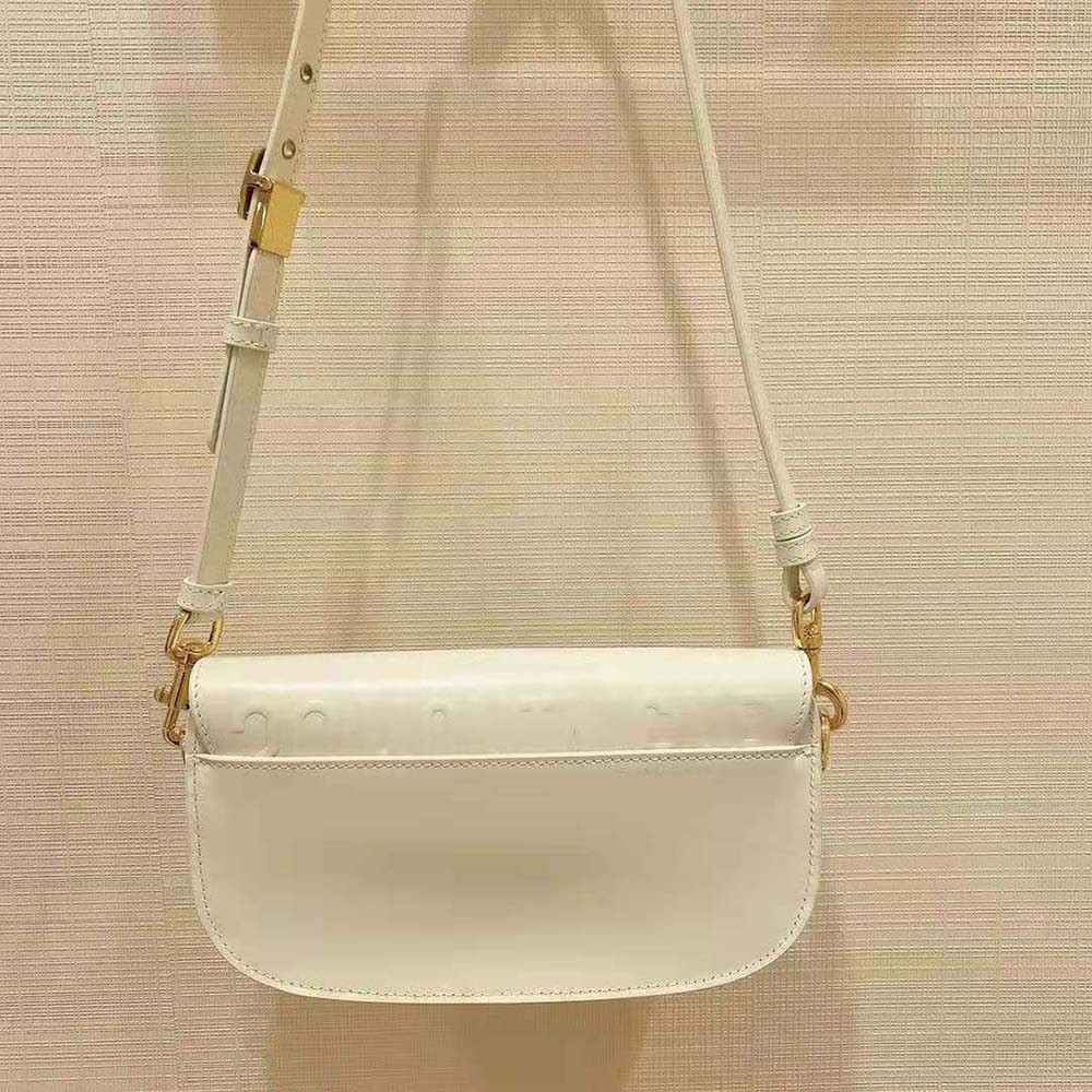 Side angle showing smooth Amber Box calfskin texture on Dior Bobby bag
