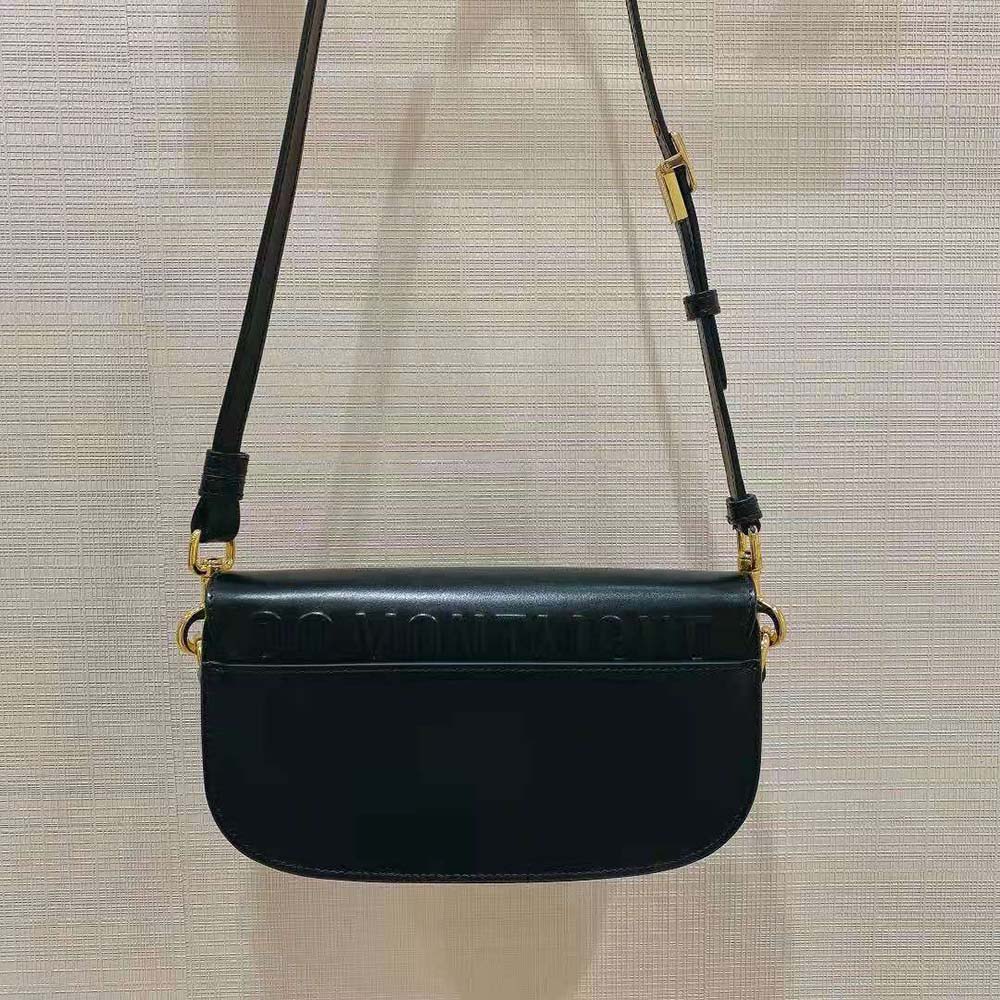 Side angle showing smooth black calfskin texture on Dior Women Dior Bobby Bobby East-West Bag