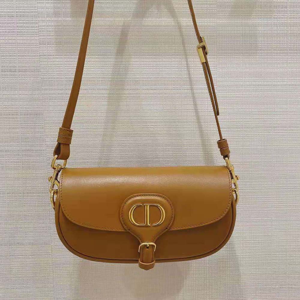 Close-up of gold-tone CD hardware on Dior Women Dior Bobby East-West Bag